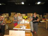 members packing books which are distributed through local libraries 