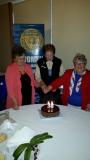  38 year celebration 24/11/15. Founding members (left) Gloria Lennon, Liz Robertson & Kit Oerman cut the cake