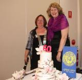 60th anniversary cake cutting with Teresa Lyford SISWP president