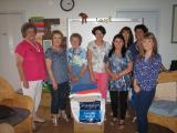 Donating sets of towels to Eastern Domestic Violence Service